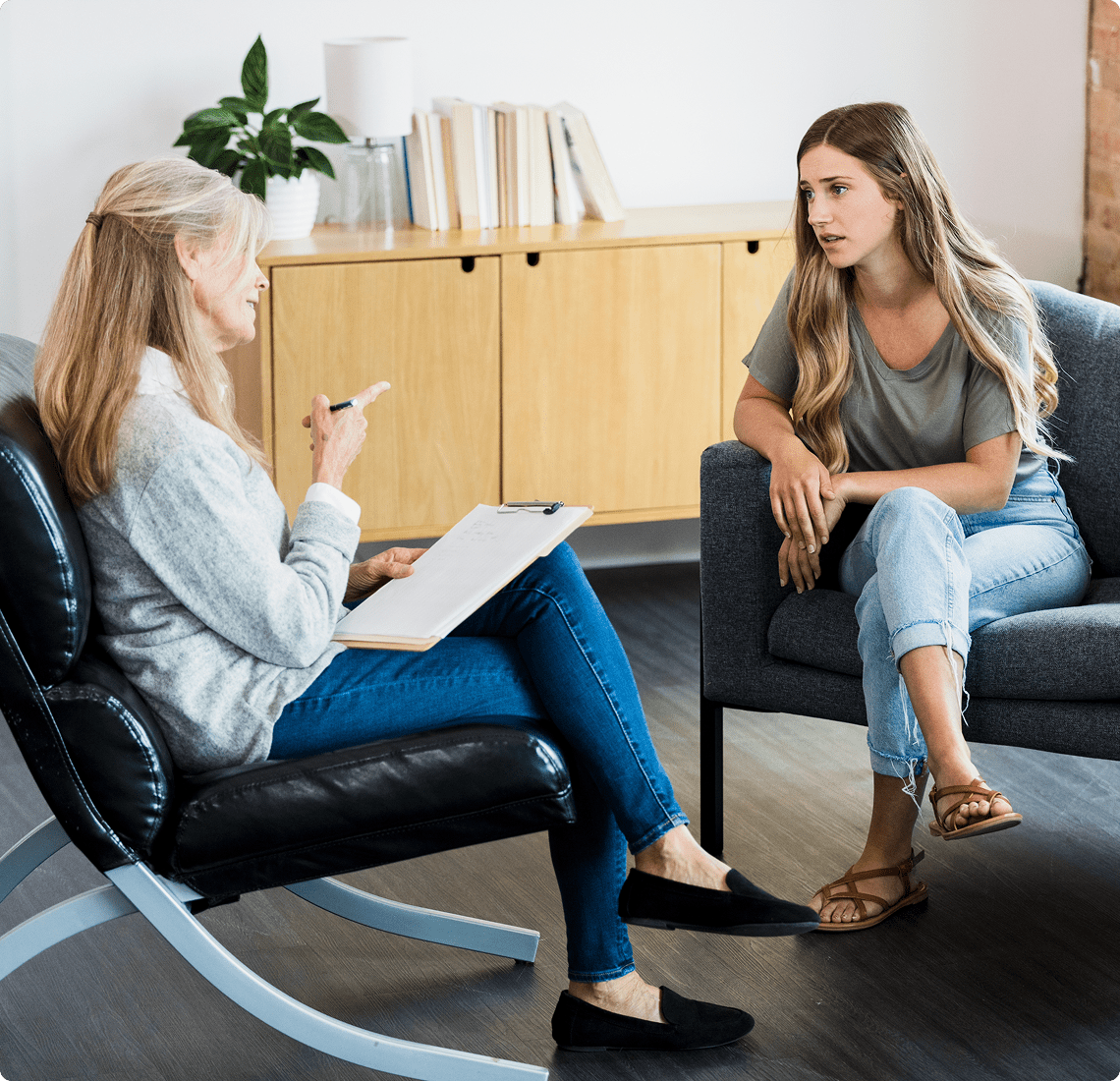 Woman sharing thoughts with counselor